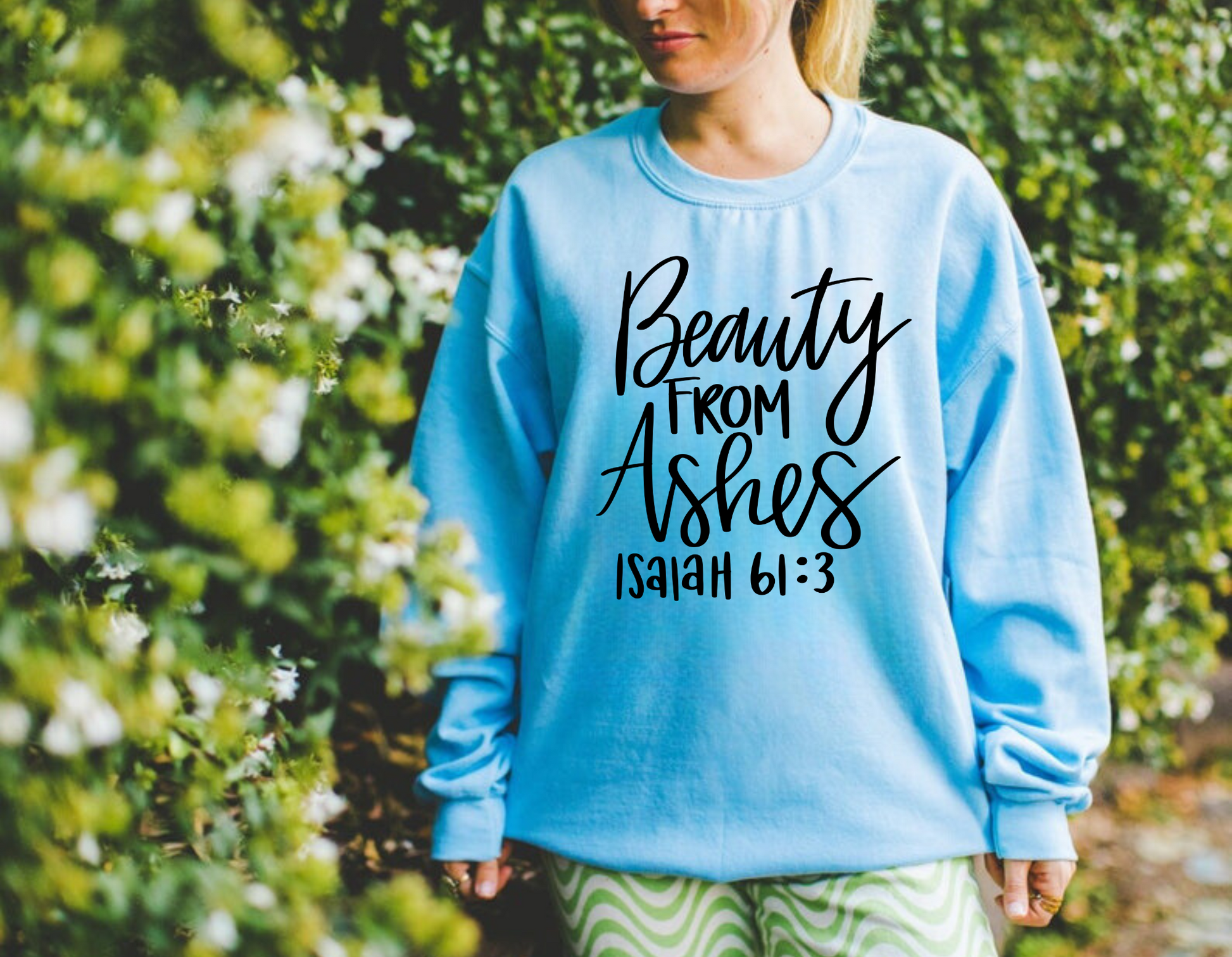 "Beauty from Ashes" Christian crewneck sweatshirt with a biblical quote.