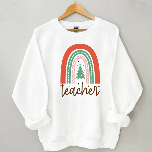 Elevate your holiday style with our Boho Teacher Christmas Sweatshirt, the perfect blend of boho charm and festive spirit. Shop now and add this delightful Teacher Christmas sweatshirt to your collection of Christmas teacher shirts.