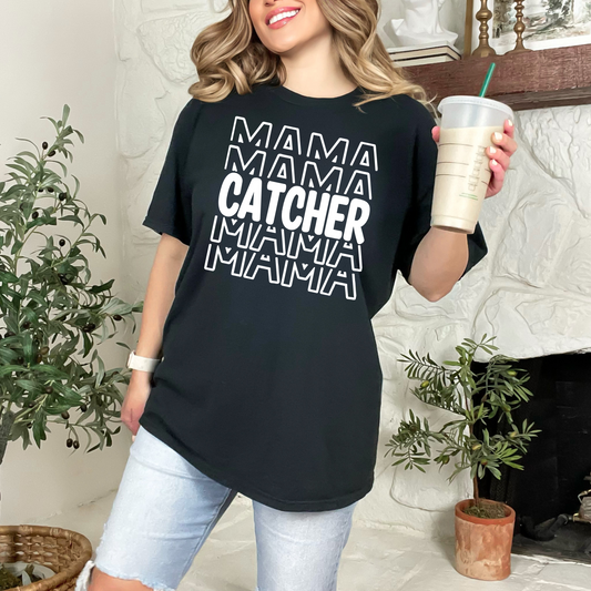 A stylish baseball mom shirt with the text 'Catcher Mama', perfect for game day and showing off your love for baseball. The shirt features a comfortable fit and is a great choice for a mom outfit at the baseball game.