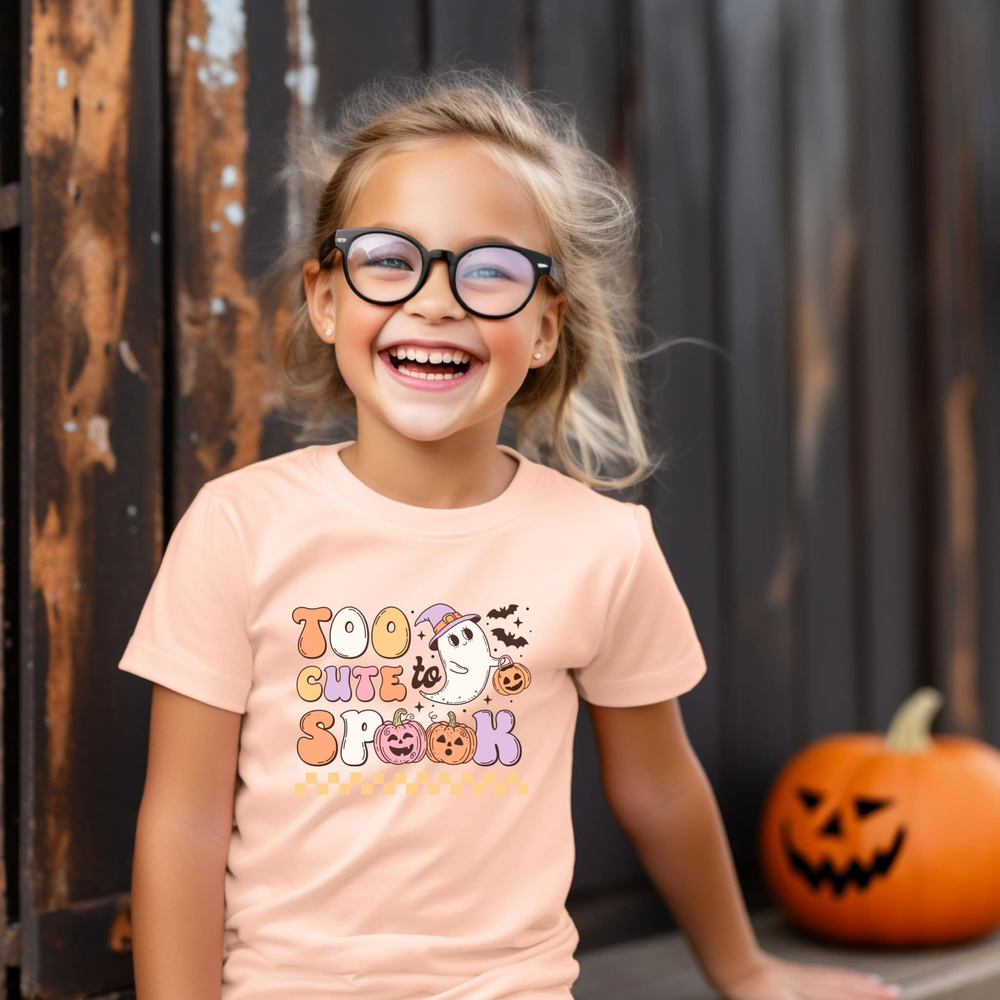 'Too Cute Too Spook' Halloween Shirt for Girls - Elevate her Halloween charm with our playful and preppy Halloween shirt, celebrating the season in adorable style. Perfect for adding a unique touch to her Halloween outfit. Shop now for the personalized kids' Halloween shirt!