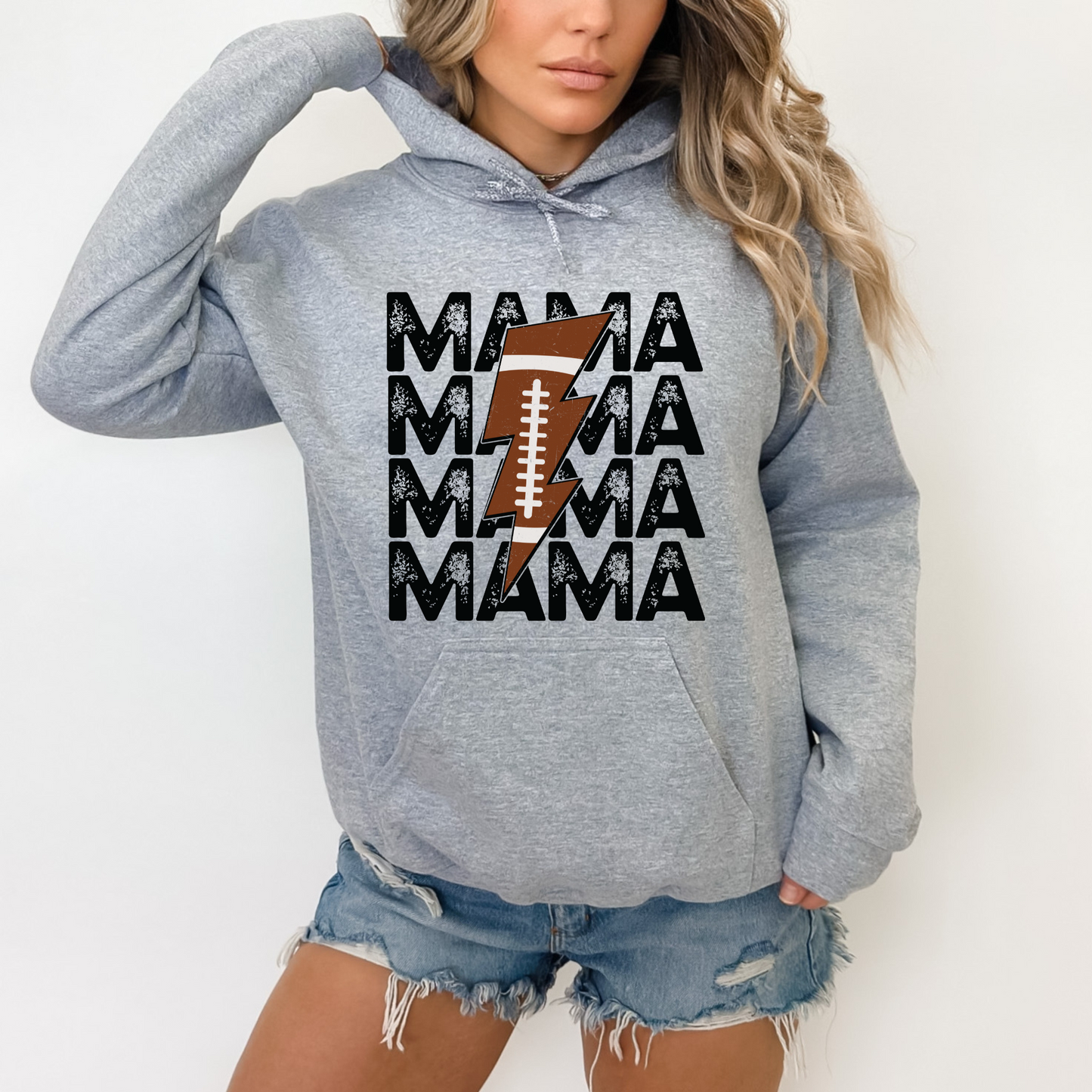 Stay cozy and comfortable while rooting for your football star with our football mom hoodie sweatshirt. Crafted for both comfort and style, this hoodie is the ultimate choice for chilly football game days. Show your support for your athlete while staying warm in this essential hoodie. Stay comfy and stylish as a proud football mama, all while enjoying the excitement of the game!