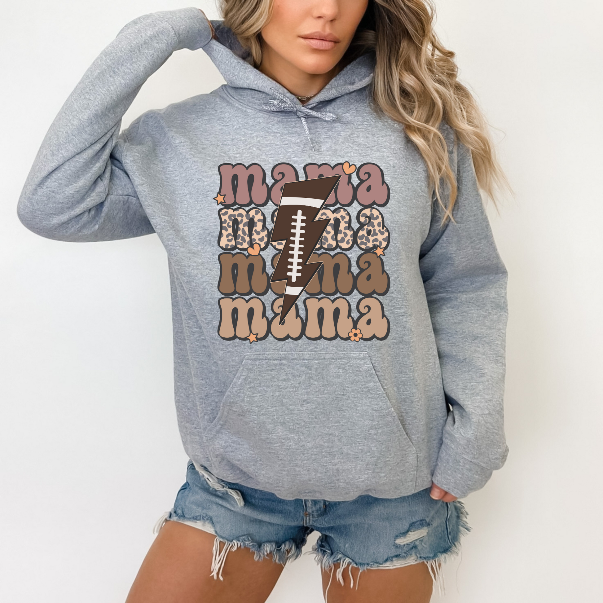 Stay cozy and comfortable while rooting for your football star with our football mom hoodie sweatshirt. Crafted for both comfort and style, this hoodie is the ultimate choice for chilly football game days. Show your support for your athlete while staying warm in this essential hoodie. Stay comfy and stylish as a proud football mama, all while enjoying the excitement of the game!