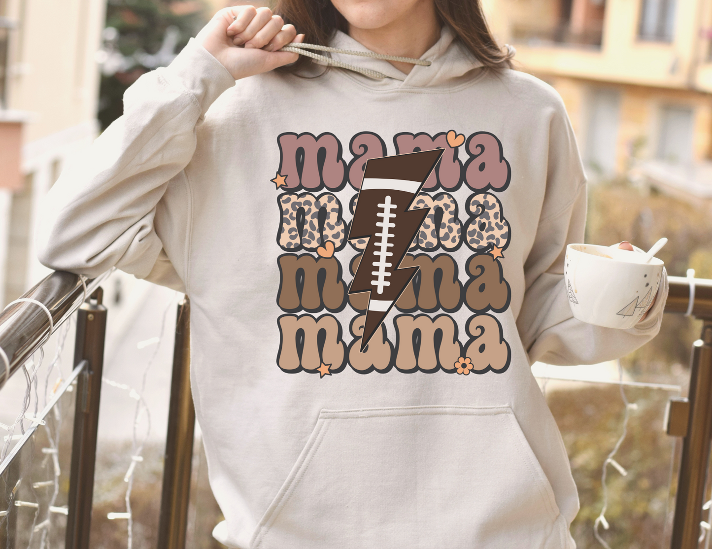 Stay cozy and comfortable while rooting for your football star with our football mom hoodie sweatshirt. Crafted for both comfort and style, this hoodie is the ultimate choice for chilly football game days. Show your support for your athlete while staying warm in this essential hoodie. Stay comfy and stylish as a proud football mama, all while enjoying the excitement of the game!