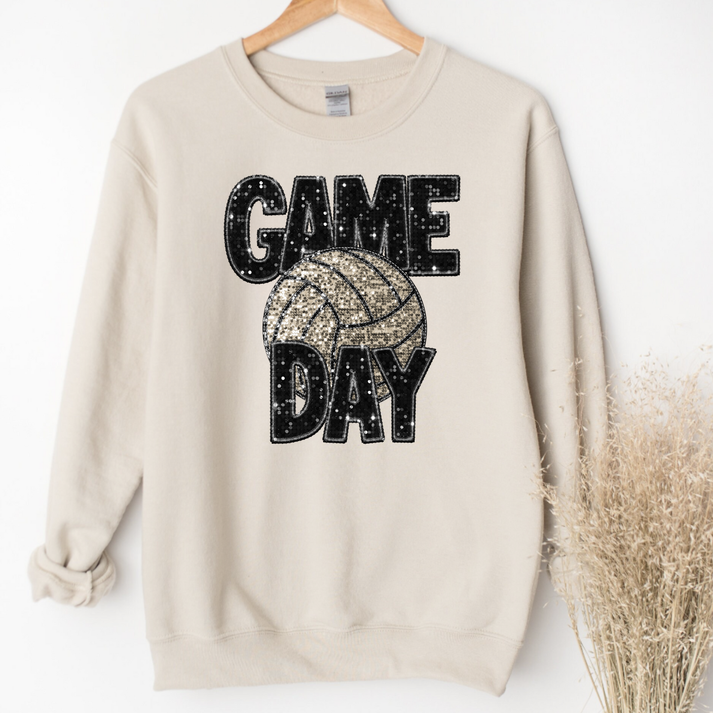 Close-up view of a cozy Glitter Volleyball Game Day Crewneck Sweatshirt in sparkling design, perfect as a trendy volleyball mom gift for a comfy and stylish volleyball game day outfit.