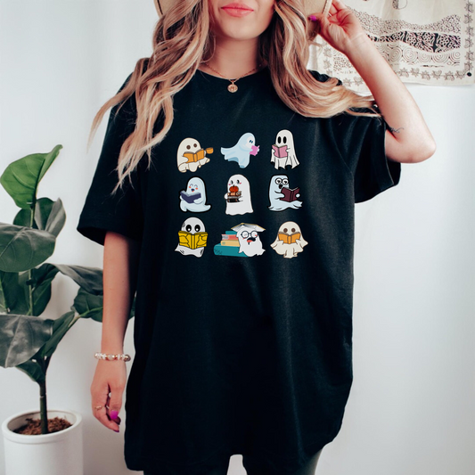 Teacher Halloween shirt featuring cute ghosts reading books, ideal for a funny and adorable teacher fall outfit. A playful design perfect for embracing the Halloween spirit.