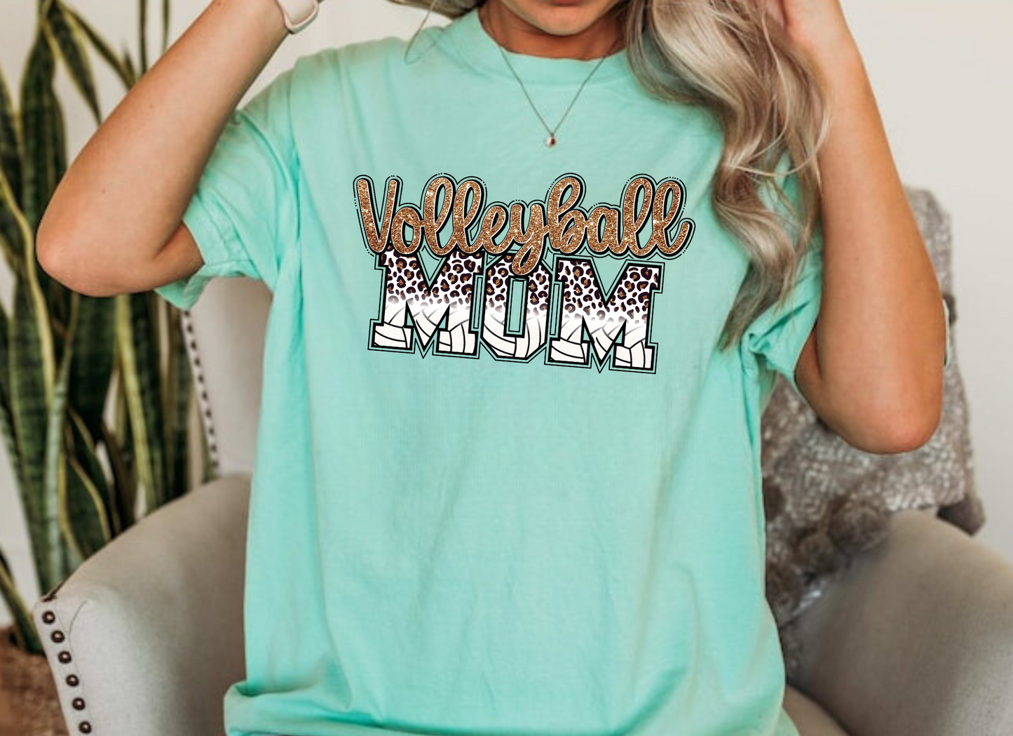 Leopard print volleyball mom shirt.