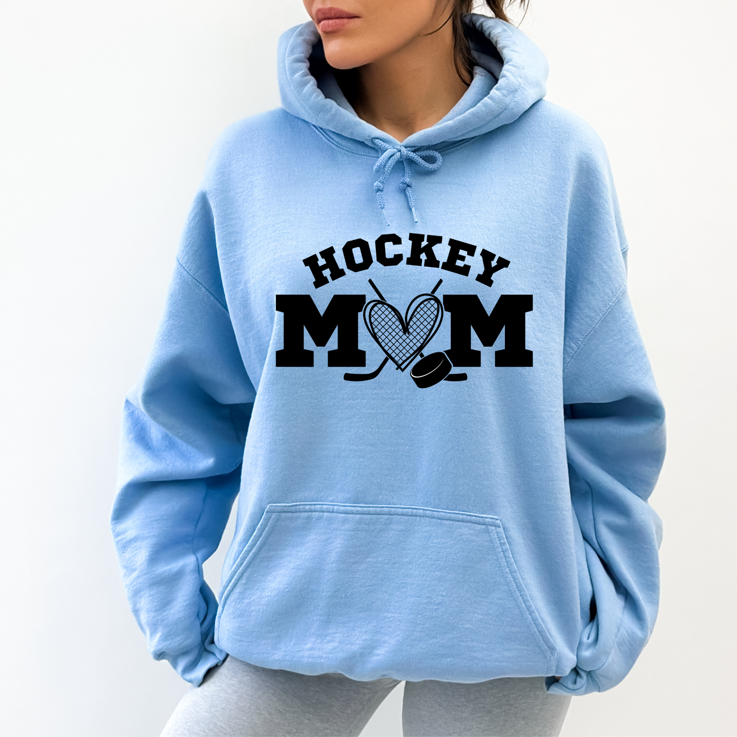 Cozy hockey mom hoodie - Stay warm and stylish on game day with this comfortable sweatshirt designed for hockey moms and hockey mamas. Perfect for supporting players in chilly rinks or cheering from the stands.