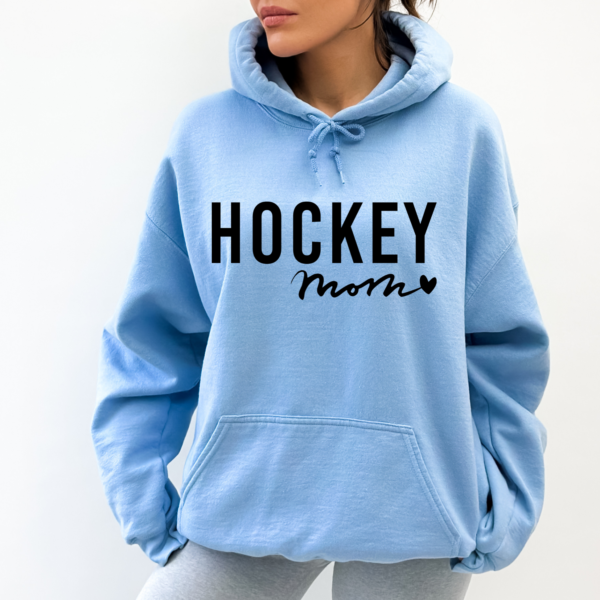 Cozy hockey mom hoodie - Stay warm and stylish on game day with this comfortable sweatshirt designed for hockey moms and hockey mamas. Perfect for supporting players in chilly rinks or cheering from the stands.