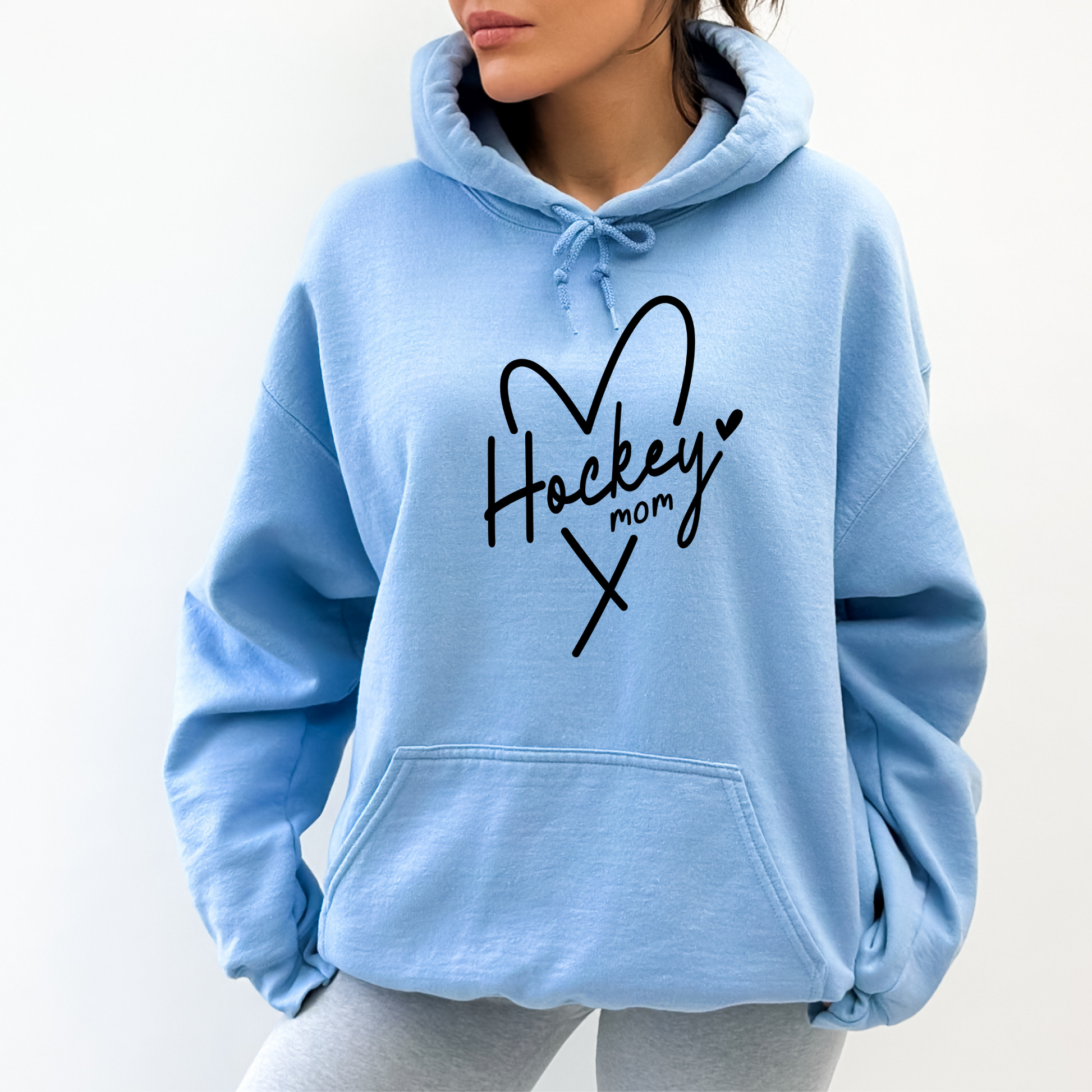 Cozy hockey mom hoodie - Stay warm and stylish on game day with this comfortable sweatshirt designed for hockey moms and hockey mamas. Perfect for supporting players in chilly rinks or cheering from the stands.