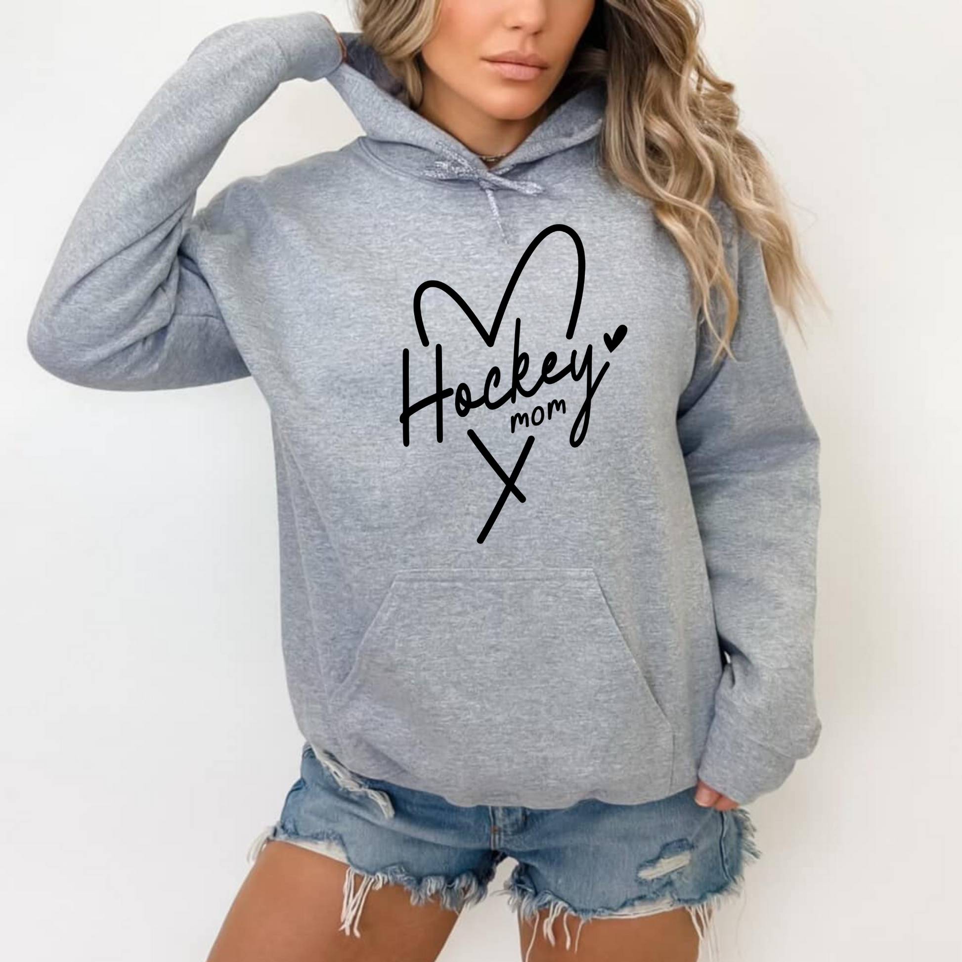 Cozy hockey mom hoodie - Stay warm and stylish on game day with this comfortable sweatshirt designed for hockey moms and hockey mamas. Perfect for supporting players in chilly rinks or cheering from the stands.