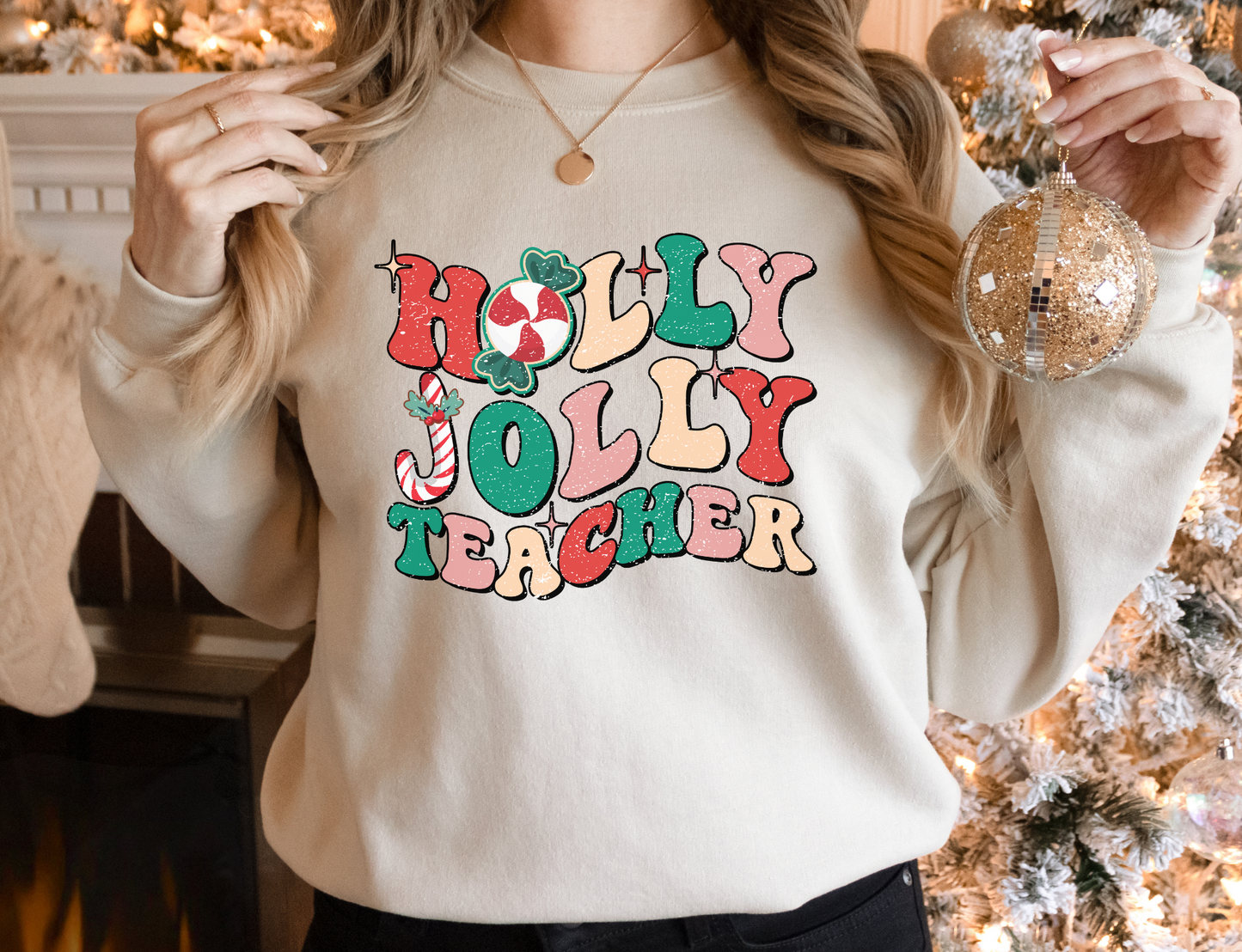 A cute and trendy 'Holly Jolly Teacher' Retro Christmas sweatshirt, perfect for embracing the festive season with a touch of retro charm. The sweater is designed for teachers who want to add holiday cheer to their winter style.