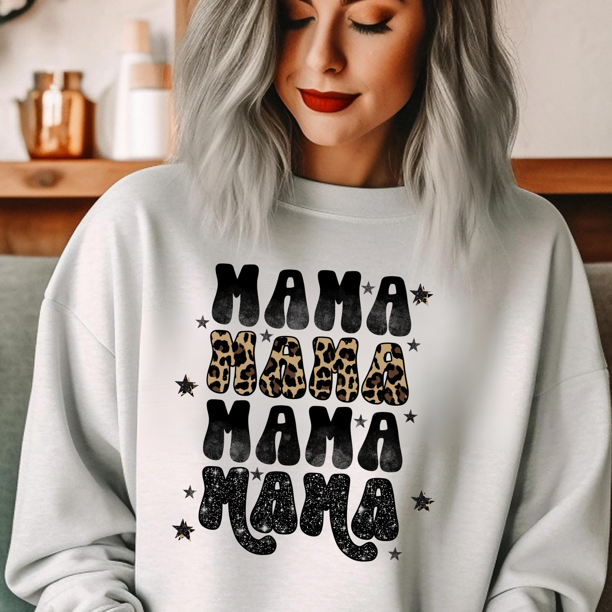 A cozy and stylish leopard print mama crewneck sweatshirt. This oversized and comfy sweatshirt is perfect for moms, featuring a trendy leopard print design. Shop now and add this cute and cozy mama crewneck sweatshirt to your mom wardrobe.