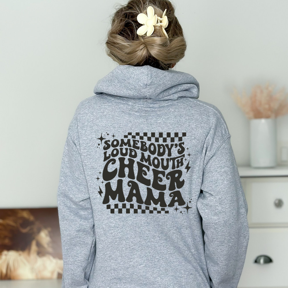 'Somebody's Loud Mouth Cheer Mama' hoodie. This sweatshirt is ideal for showcasing support for cheerleaders, offering a mix of comfort and style in a humorous design.