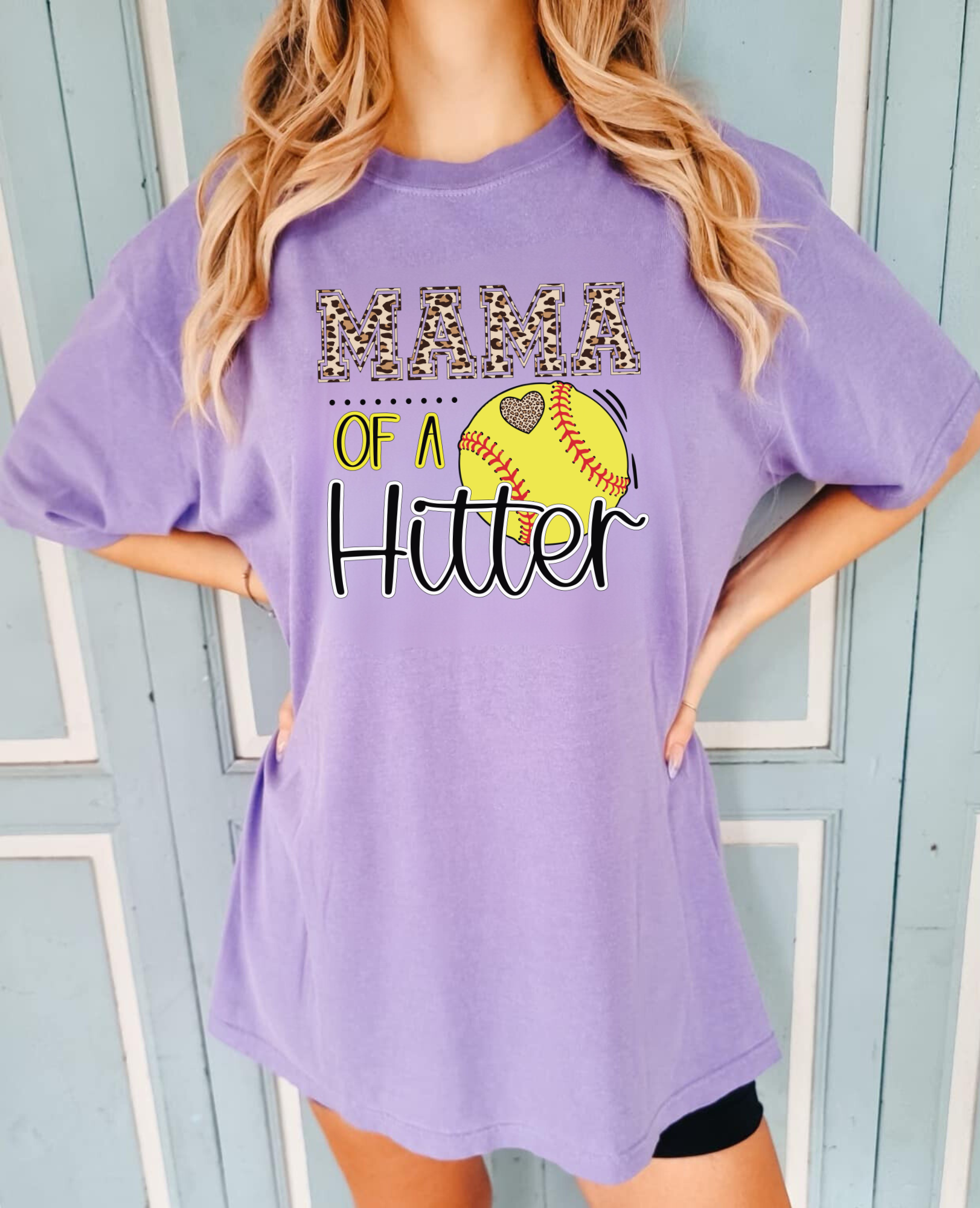 Mama of a Hitter, a trendy softball mom shirt that is perfect for softball game day!