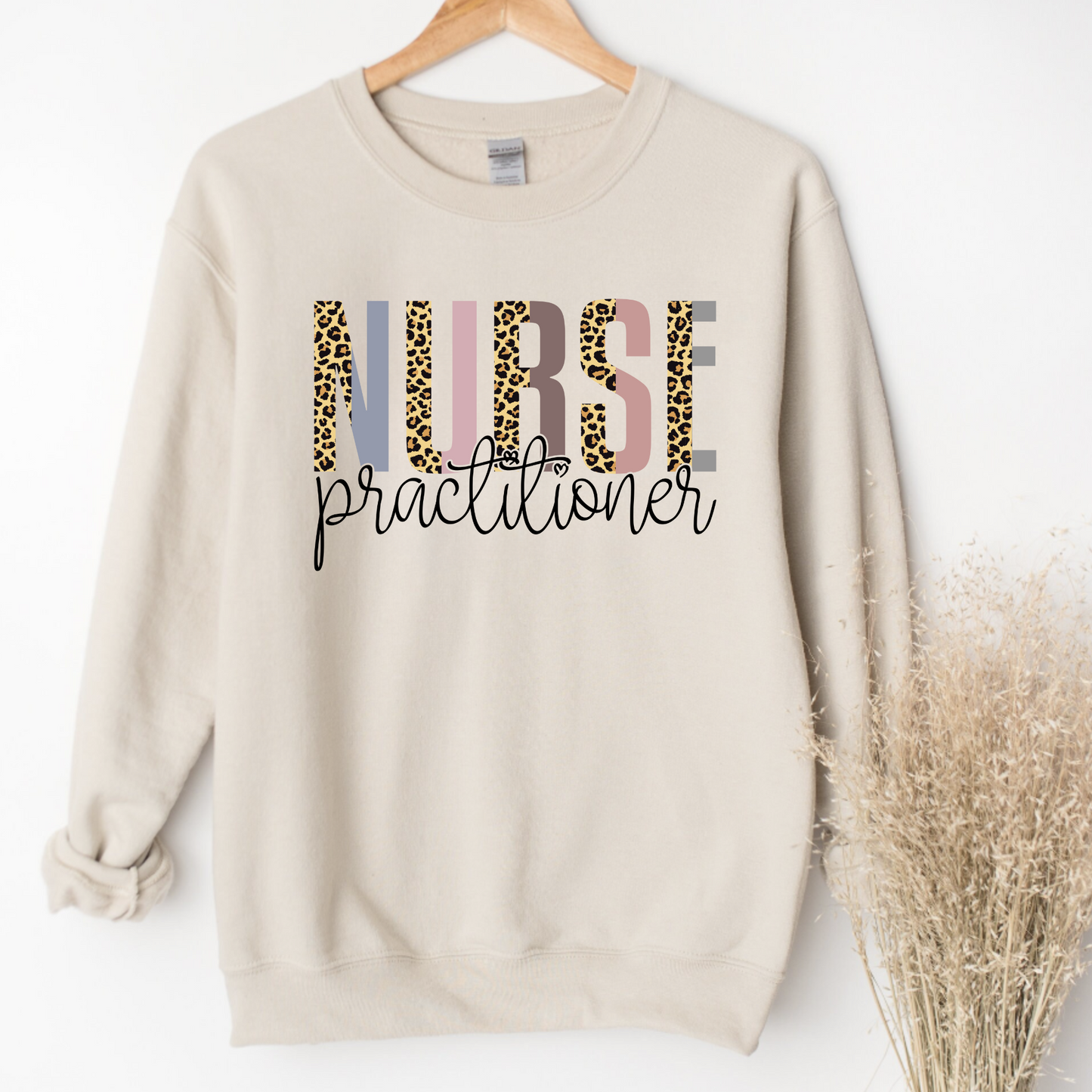 Leopard print Nurse Practitioner crewneck sweatshirt.