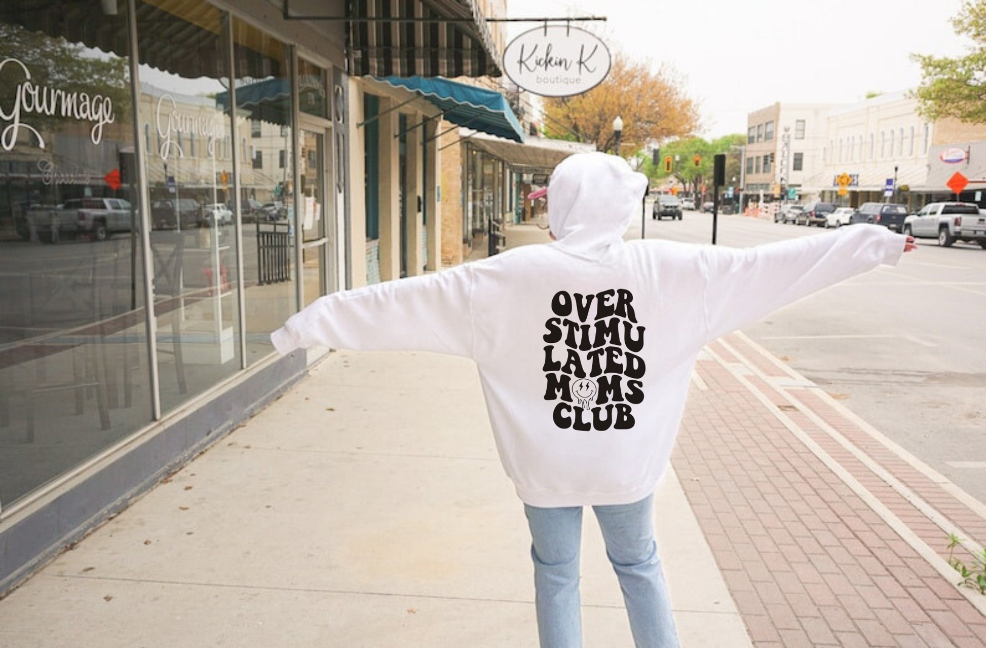 Funny 'Overstimulated Moms Club' hoodie sweatshirt for women with bold text design