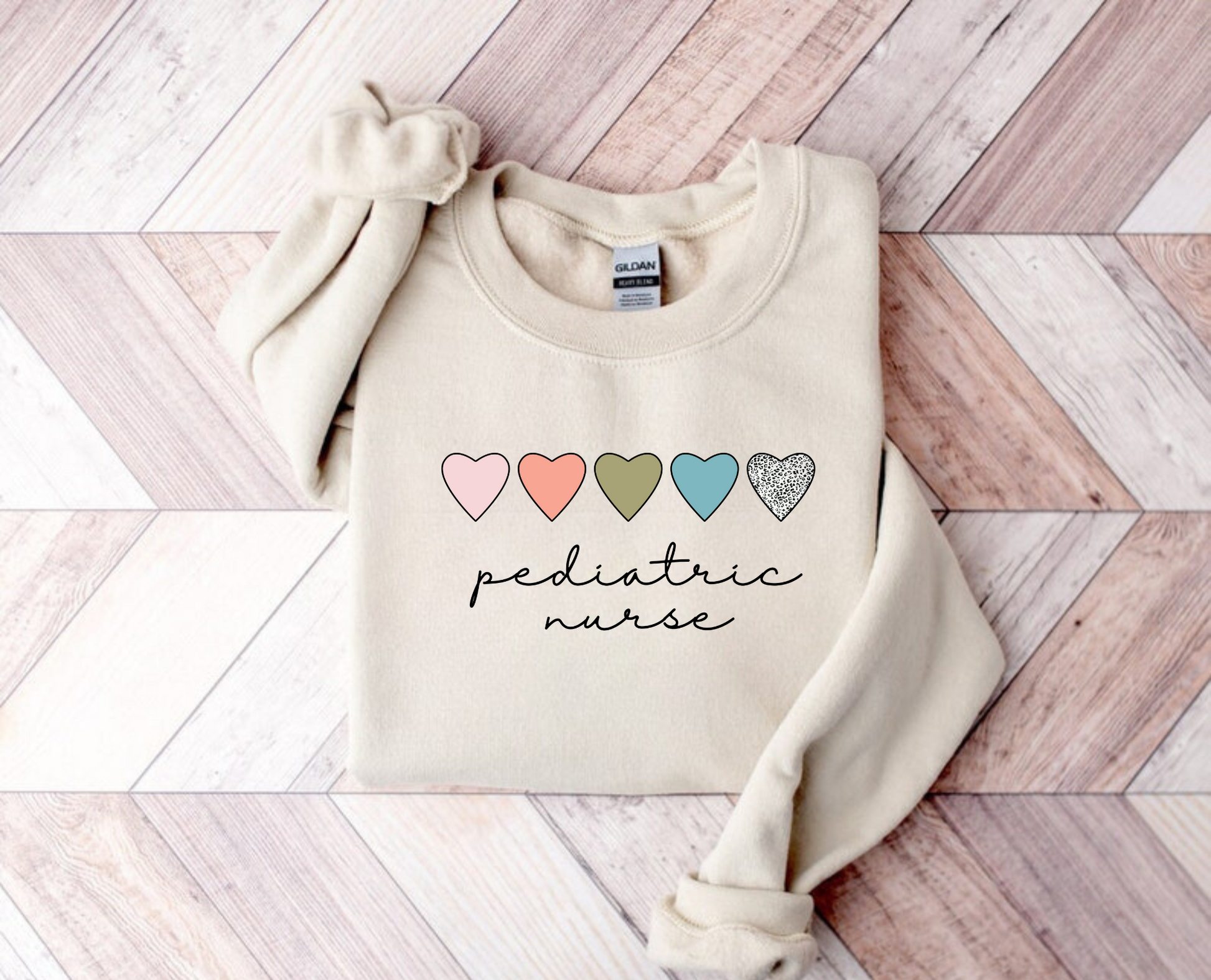 Boho Pediatric Nurse Crewneck Sweatshirt for women - stylish and comfortable nurse sweater with pediatric nurse-themed graphics. Perfect for nurse work outfits and pediatric nursing aesthetic. Ideal gift for pediatric nurses.