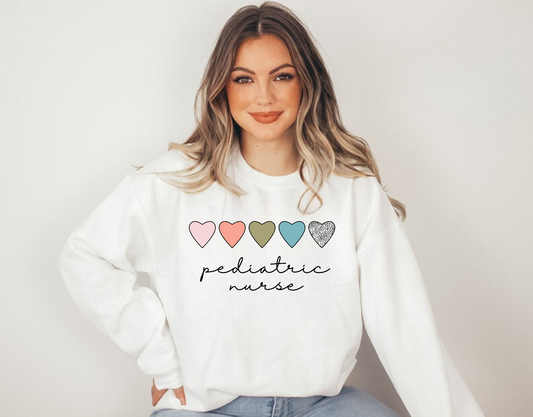 Boho Pediatric Nurse Crewneck Sweatshirt for women - stylish and comfortable nurse sweater with pediatric nurse-themed graphics. Perfect for nurse work outfits and pediatric nursing aesthetic. Ideal gift for pediatric nurses.