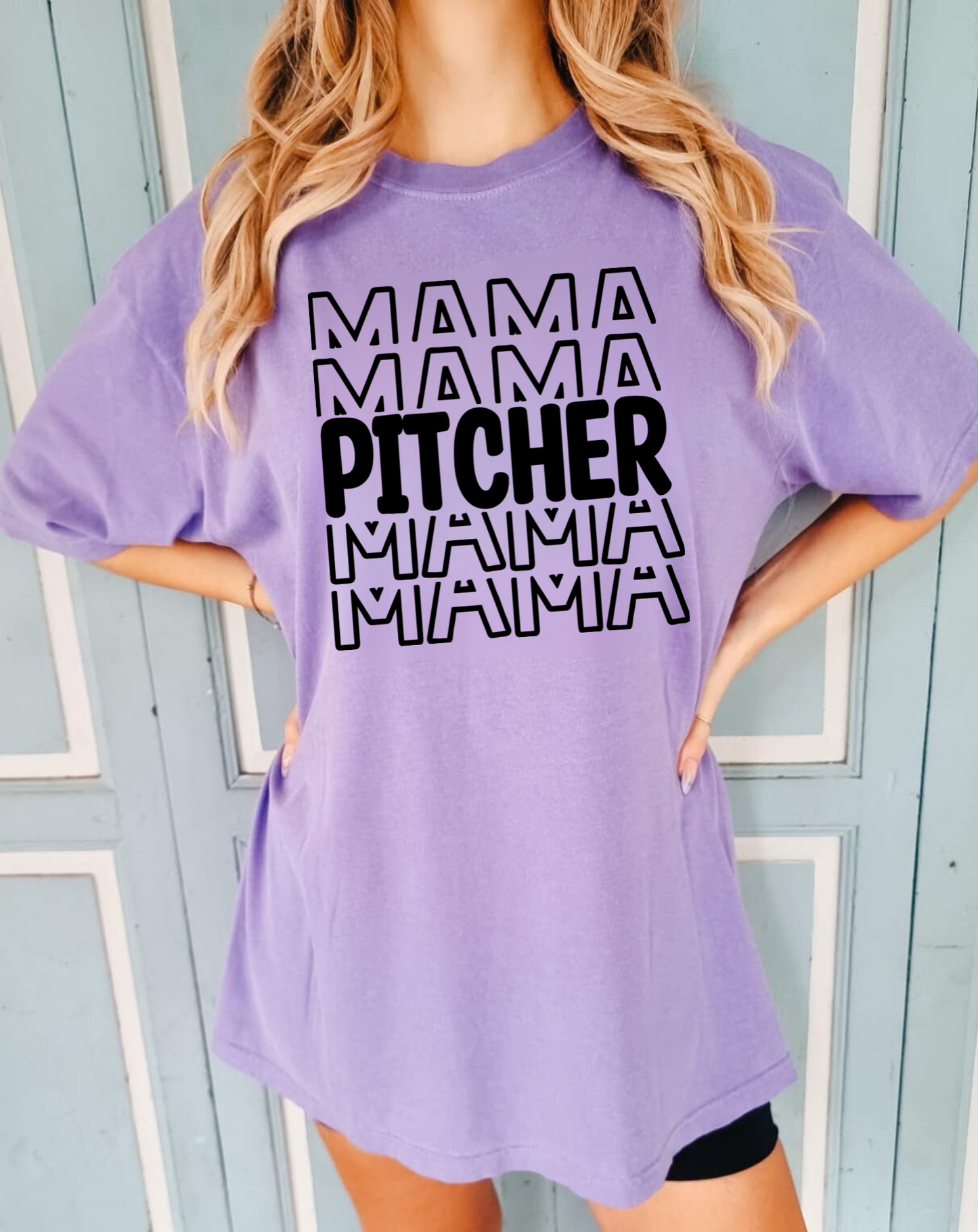 A stylish baseball mom shirt with the text 'Pitcher Mama', perfect for game day and showing off your love for baseball. The shirt features a comfortable fit and is a great choice for a mom outfit at the baseball game.