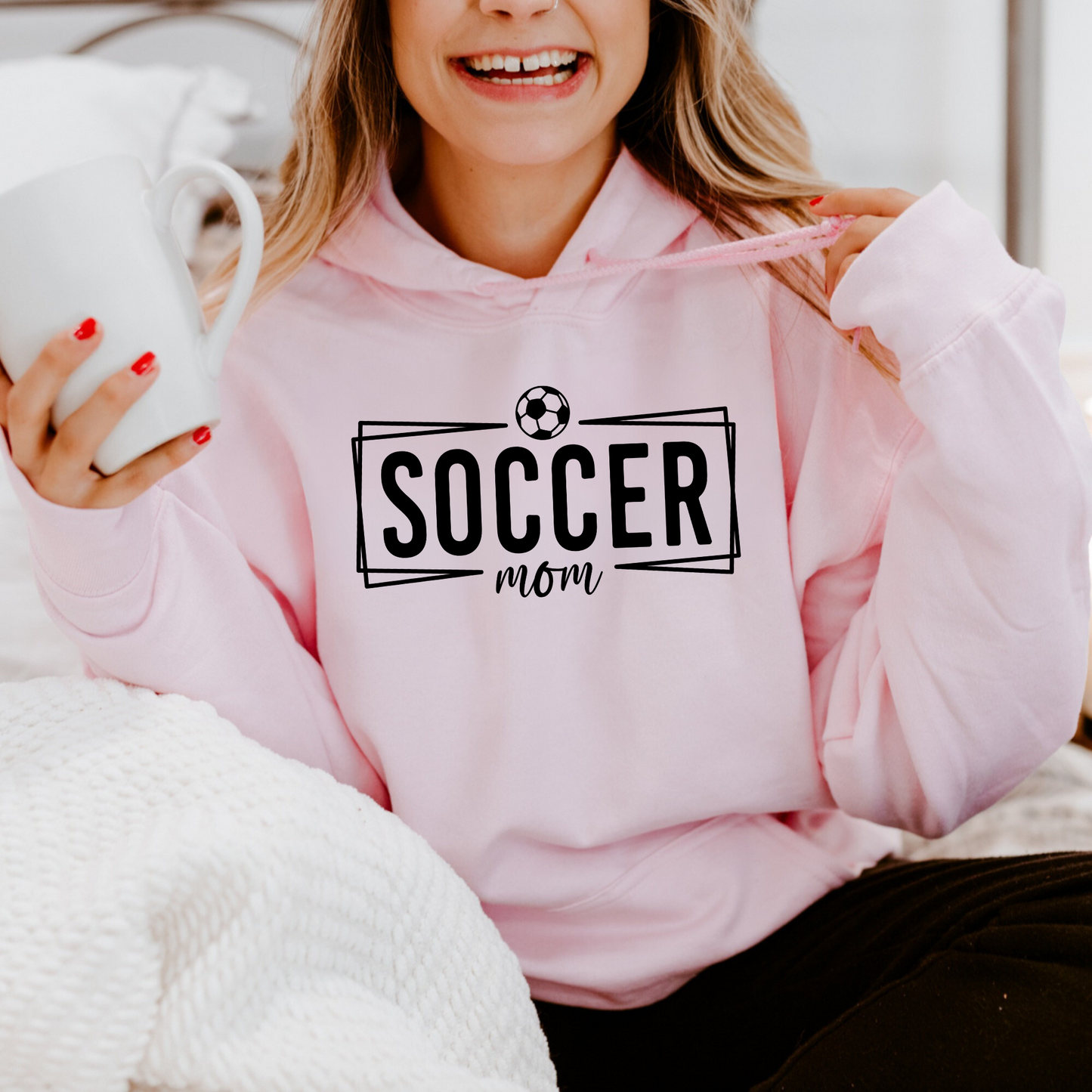 Cozy soccer mom hoodie sweatshirt - Stay warm and comfortable while supporting your soccer player at the games. Perfect for stylishly cheering on your athlete as a soccer mama.