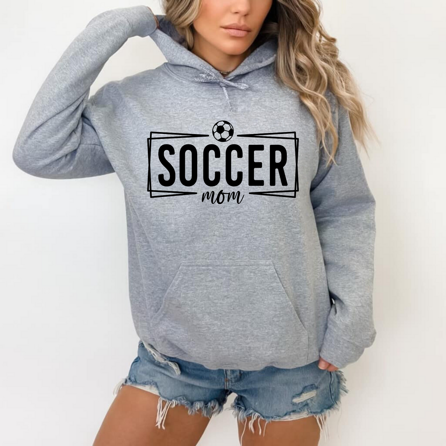 Cozy soccer mom hoodie sweatshirt - Stay warm and comfortable while supporting your soccer player at the games. Perfect for stylishly cheering on your athlete as a soccer mama.