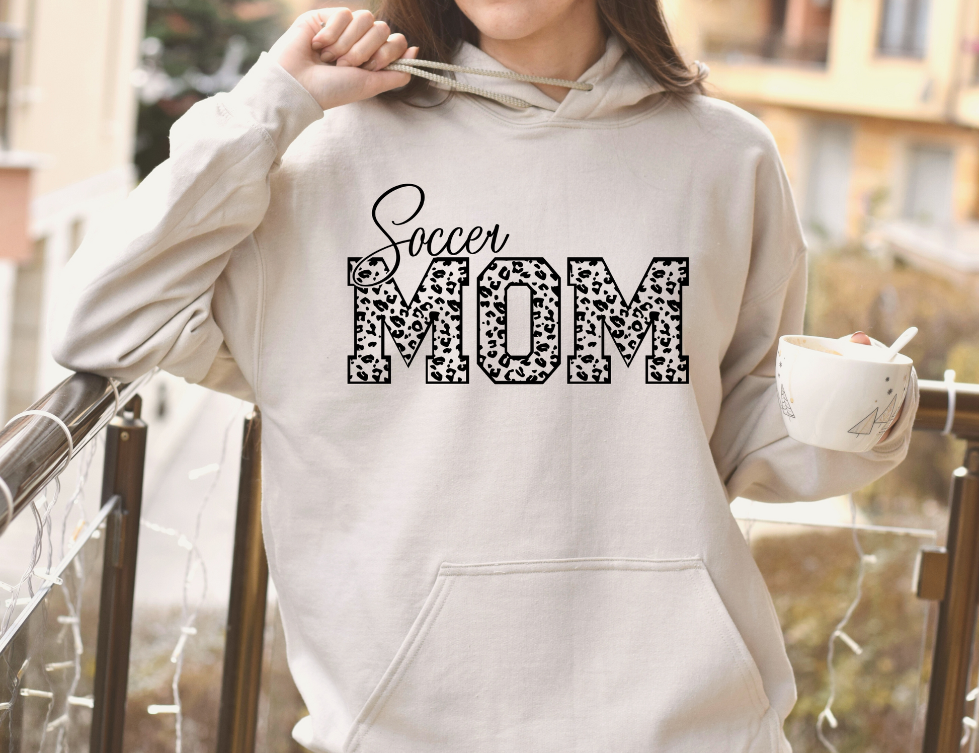 Cozy soccer mom hoodie sweatshirt - Stay warm and comfortable while supporting your soccer player at the games. Perfect for stylishly cheering on your athlete as a soccer mama.