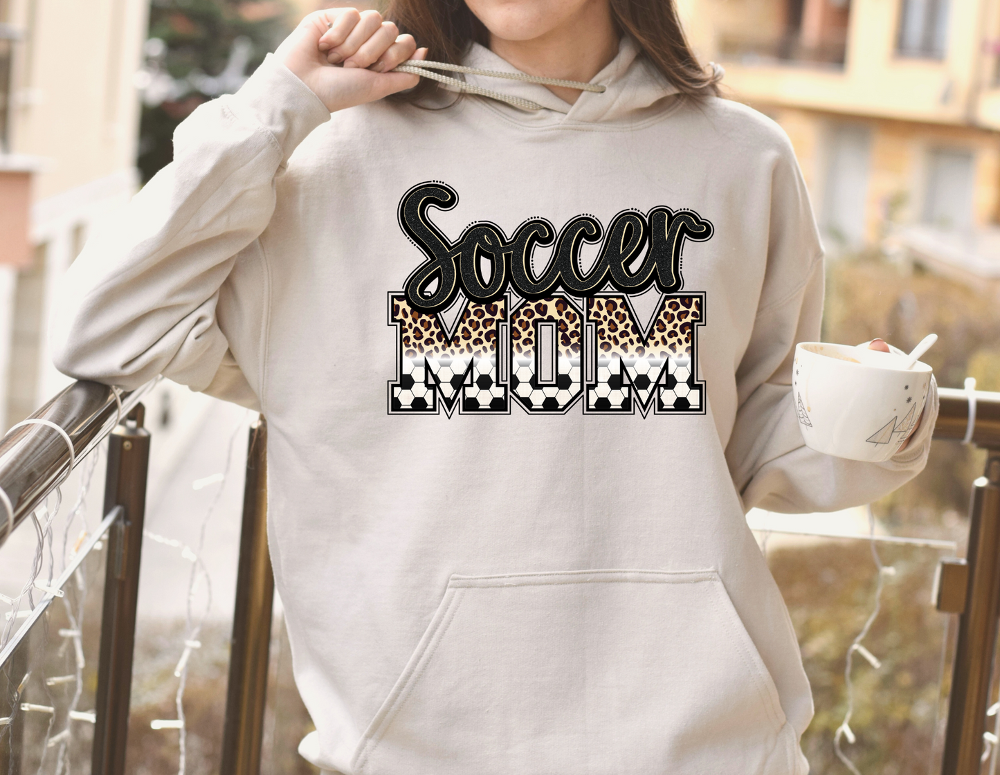 Cozy soccer mom hoodie sweatshirt - Stay warm and comfortable while supporting your soccer player at the games. Perfect for stylishly cheering on your athlete as a soccer mama.