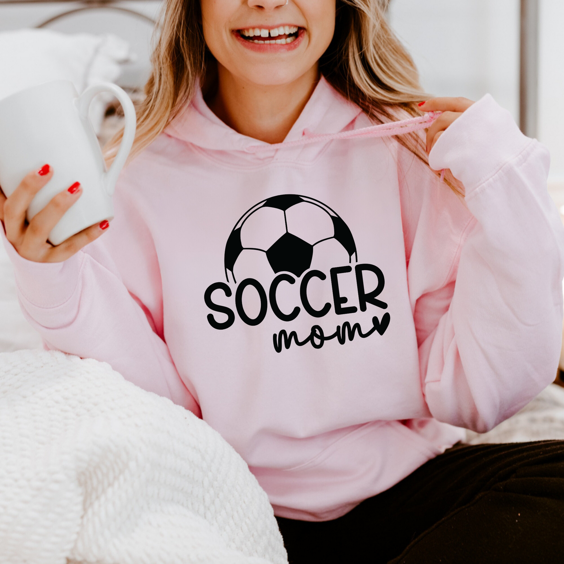 Cozy soccer mom hoodie sweatshirt - Stay warm and comfortable while supporting your soccer player at the games. Perfect for stylishly cheering on your athlete as a soccer mama.