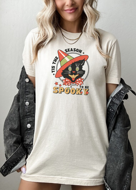 Vintage retro Halloween shirt with black cat design and "'Tis the Season to be Spooky" phrase - Embrace the Halloween spirit with this graphic tee that blends vintage charm and fall vibes. Oversized comfort colors shirt for a touch of nostalgia. Perfect for fall and Halloween fashion.