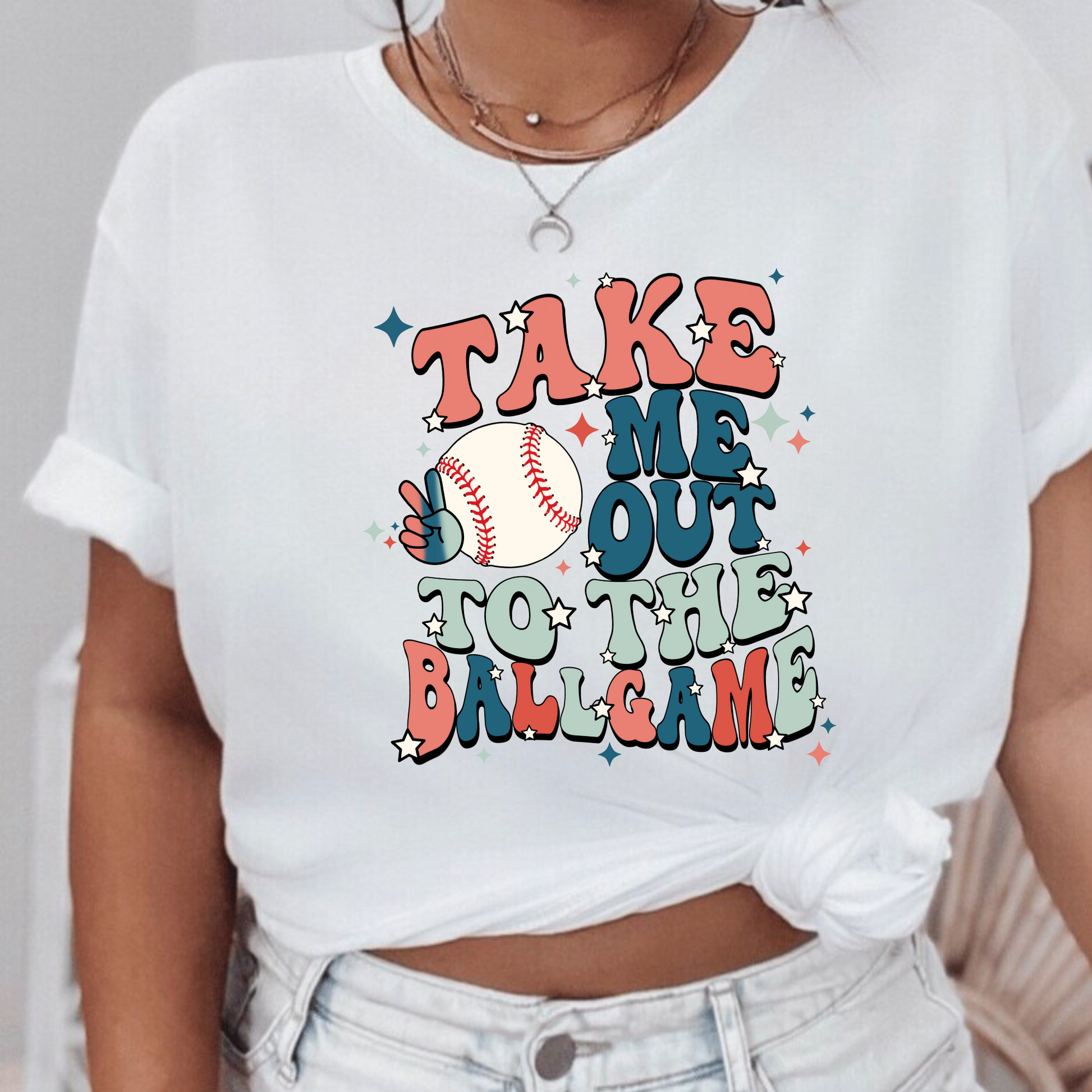 Retro Baseball Shirt with the phrase 'Take me out to the ballgame'. A trendy and cute graphic tee for baseball game days and baseball moms. Perfect for showcasing team spirit with a vintage flair