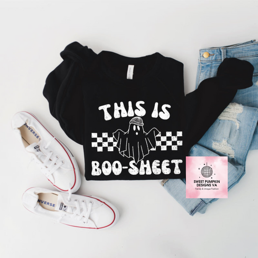 A funny Halloween sweatshirt with the phrase 'this is boo sheet' written on it. This cozy and humorous sweatshirt is perfect for adding a touch of humor to your Halloween outfit. Shop now and embrace the spooky season in style!