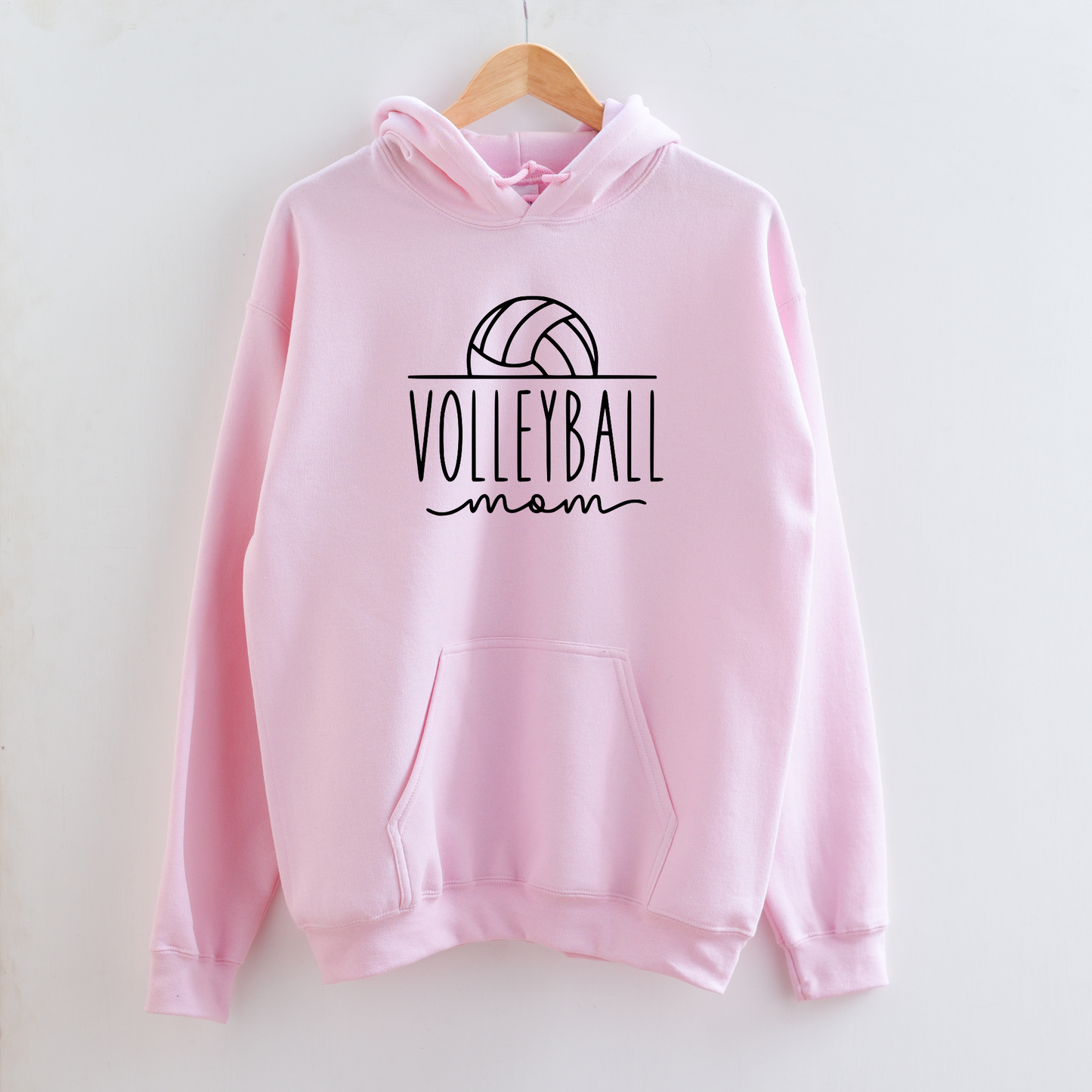 Cozy volleyball mom hoodie sweatshirt - Show your support in comfort with this essential hoodie perfect for volleyball games. Stay cozy and stylish as a proud volleyball mama.