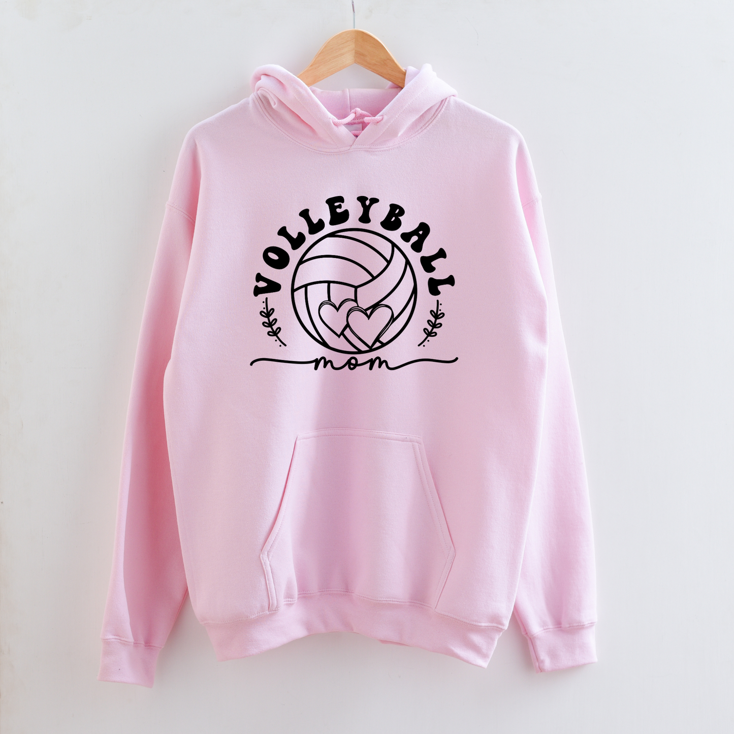 Cozy volleyball mom hoodie sweatshirt - Show your support in comfort with this essential hoodie perfect for volleyball games. Stay cozy and stylish as a proud volleyball mama.