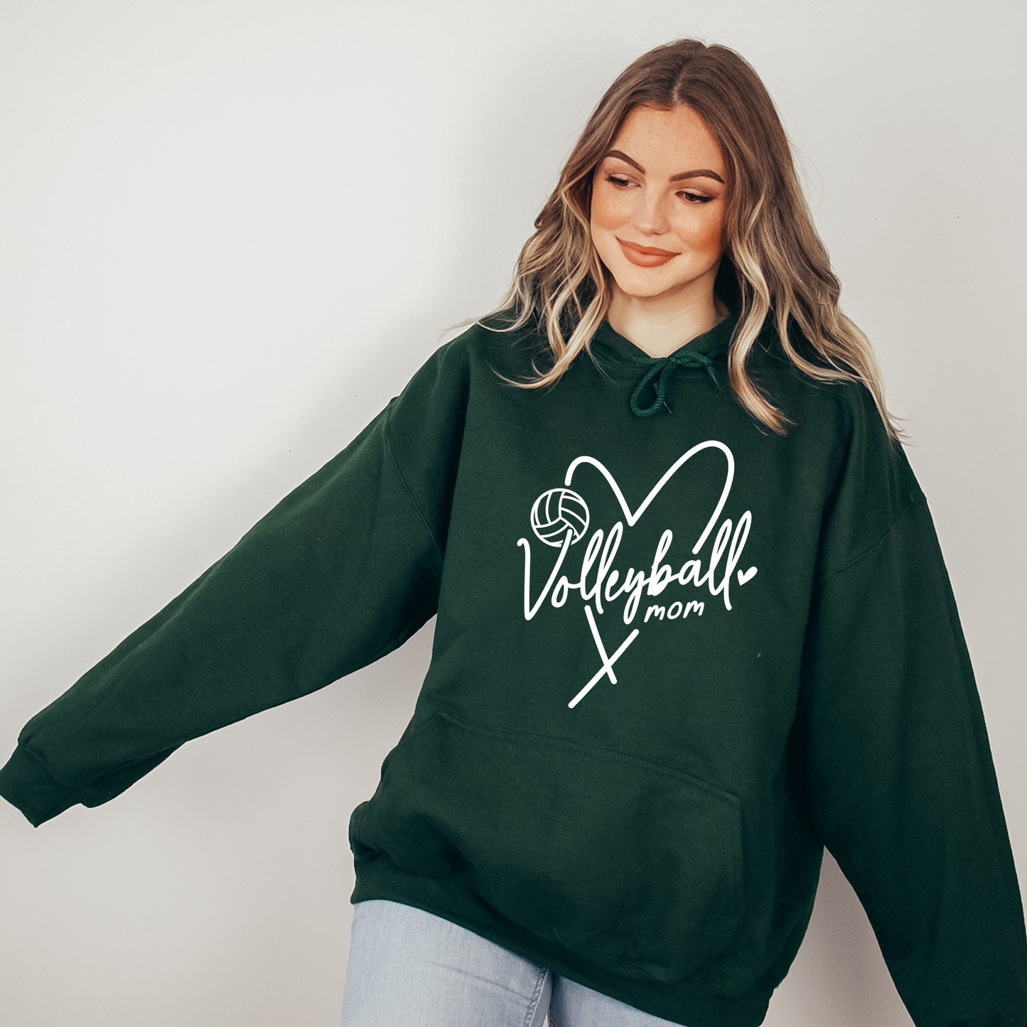 Cozy volleyball mom hoodie sweatshirt - Show your support in comfort with this essential hoodie perfect for volleyball games. Stay cozy and stylish as a proud volleyball mama.