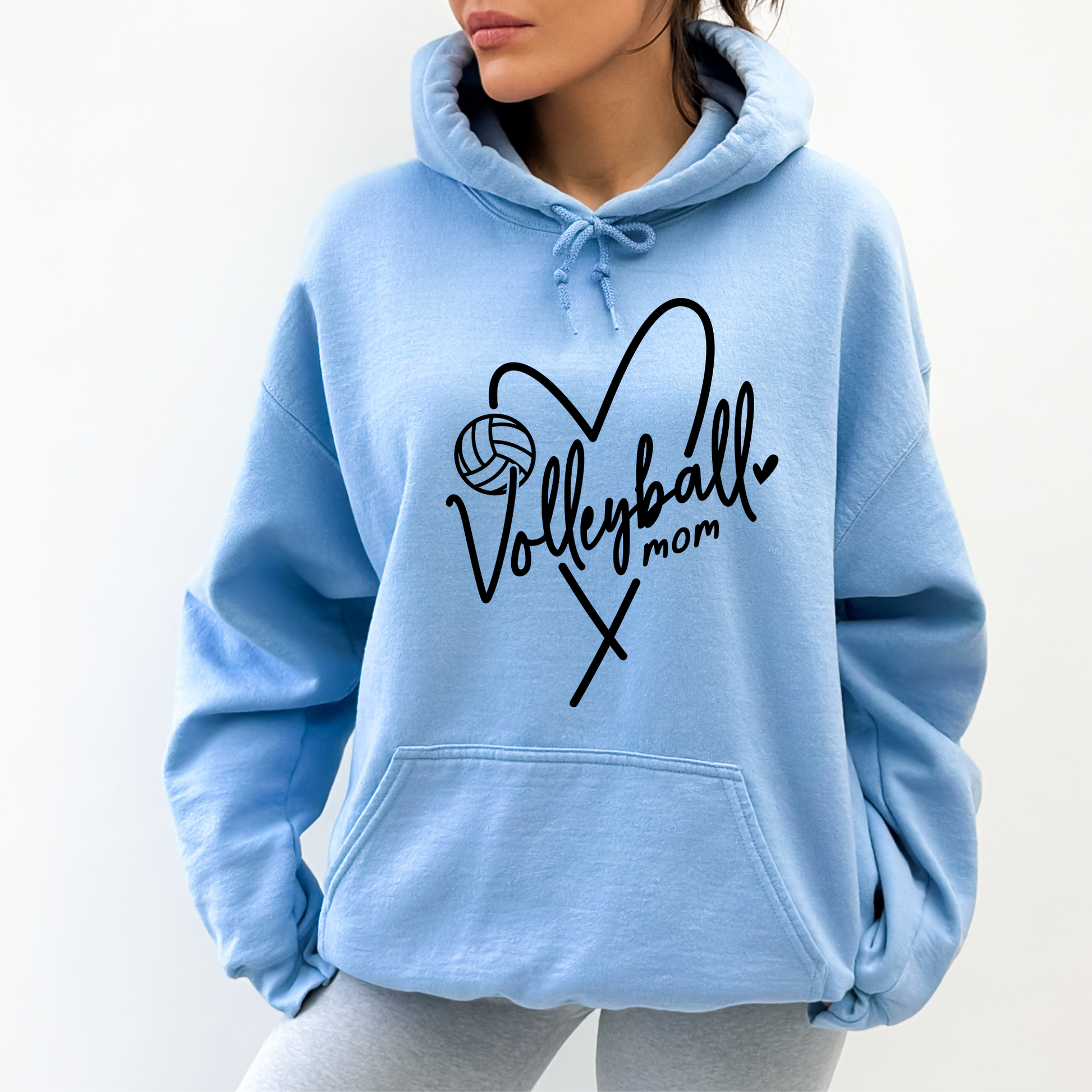 Cozy volleyball mom hoodie sweatshirt - Show your support in comfort with this essential hoodie perfect for volleyball games. Stay cozy and stylish as a proud volleyball mama.