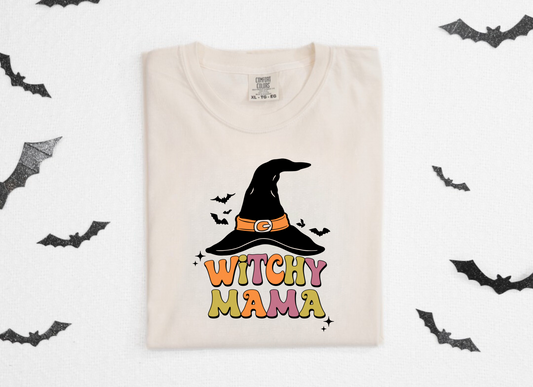 Trendy oversized preppy "Witchy Mama" Halloween shirt - Embrace fall vibes with this unique Halloween design for moms. Comfort Colors shirt for ultimate comfort, featuring a retro touch. Perfect for a stylish and cozy Halloween look!