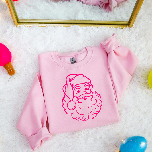 Cozy pink crewneck sweatshirt with preppy Santa design, suitable for holiday events and everyday winter style.