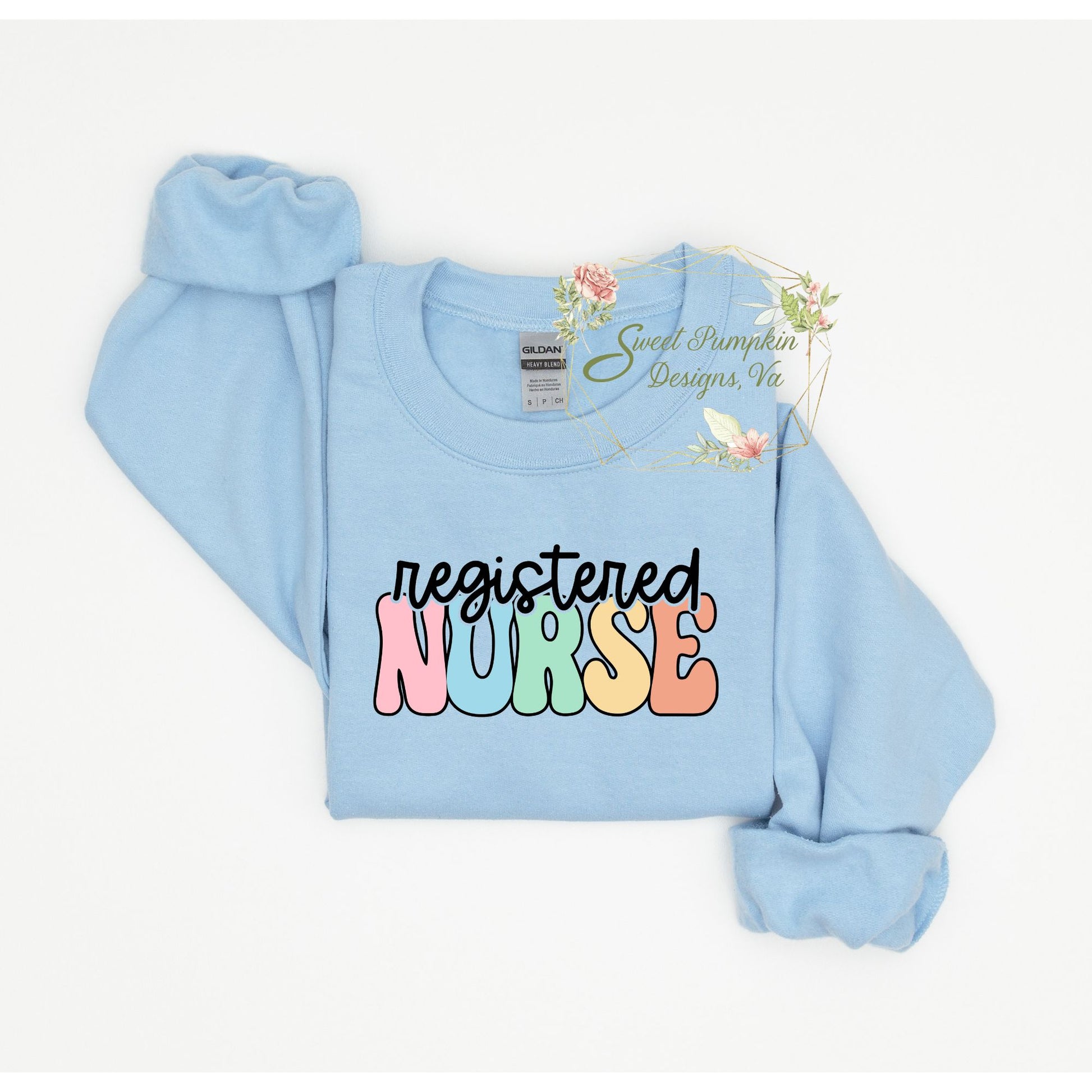 Retro Rainbow Registered Nurse Crewneck Sweatshirt - Cute and cozy nurse apparel with a vintage-inspired font in rainbow colors