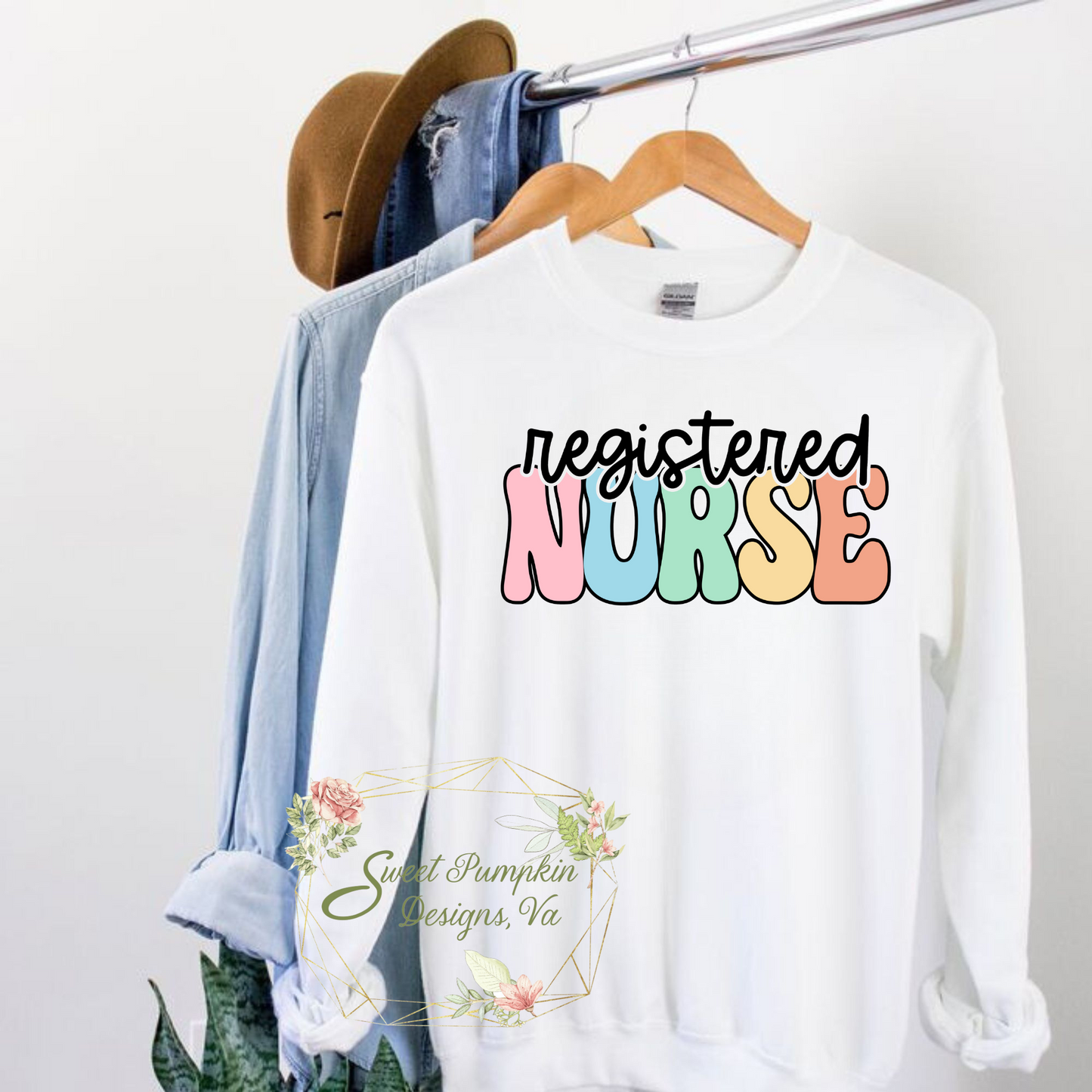 Retro Rainbow Registered Nurse Crewneck Sweatshirt - Cute and cozy nurse apparel with a vintage-inspired font in rainbow colors